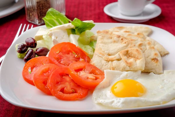 Simple Greek
(1) Egg, feta cheese, tomatoes, Kalamata olives, and pita.
_