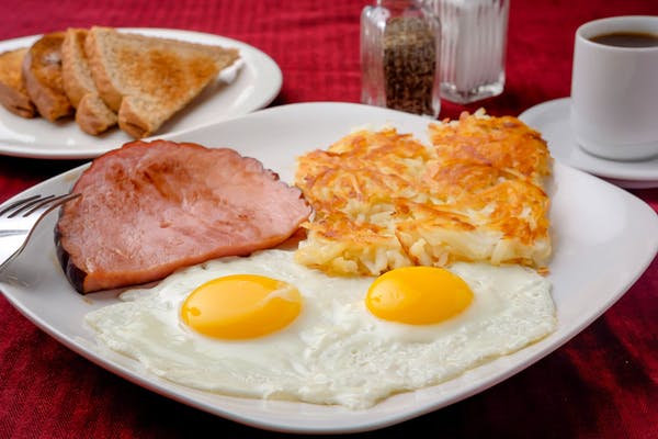 Combo -(2) Eggs, hash browns, and toast.  Add a side of ham, bacon, sausage, or gyros meat at an extra charge.
_