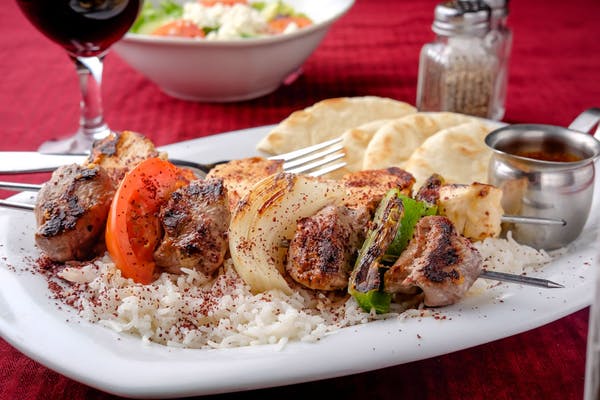 Kabobs
Marinated tender cubes of lamb or chicken skewed with slices of tomato, green pepper, and onion.
_